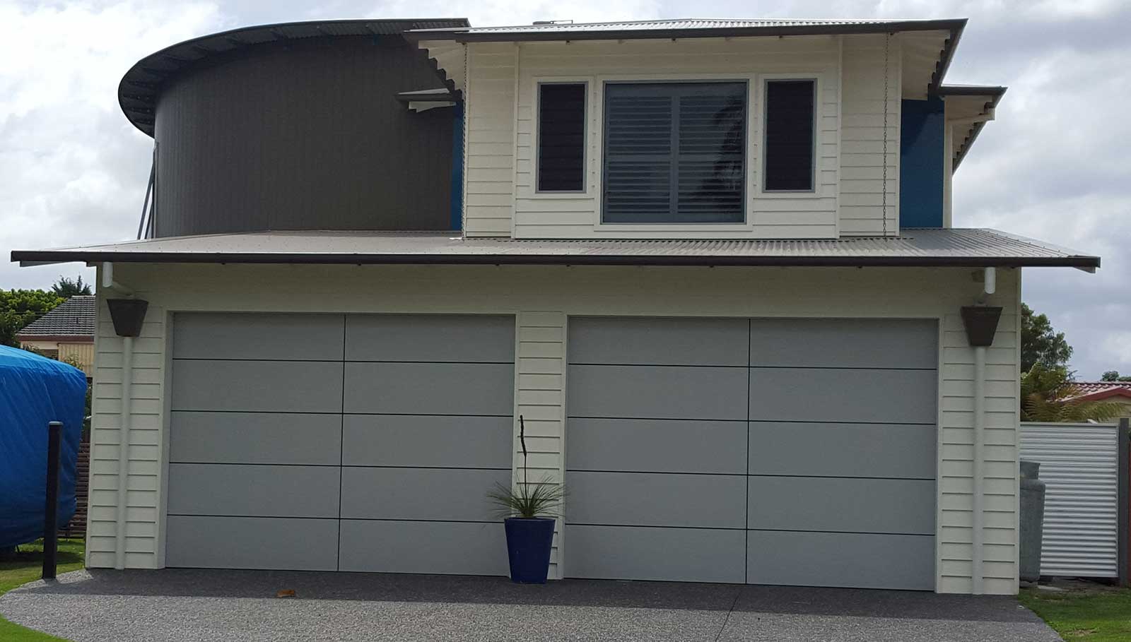 New Colorbond sectional garage door supplied and installed by Doormec in Wollongong
